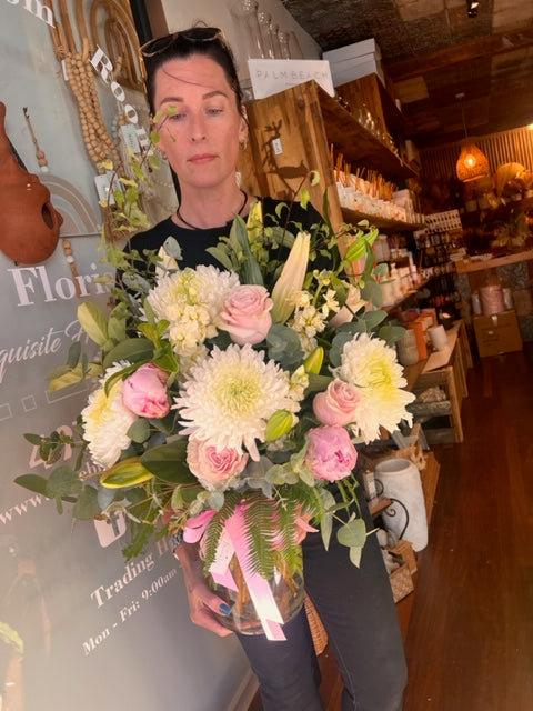 Pastel bouquet in glass vase